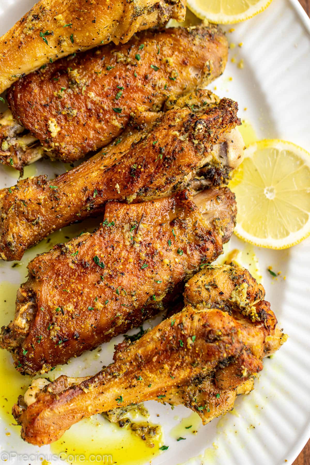 Lemon pepper turkey wings on a serving platter.