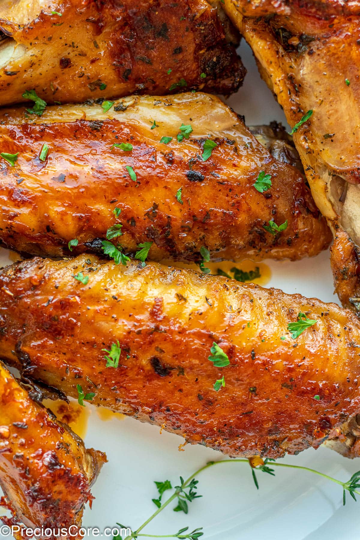 Oven Baked Turkey Wings in a white bowl.