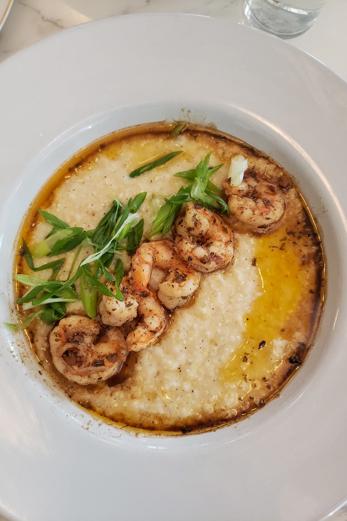 A plate of shrimp and grits at a restaurant in Austin, Texas.