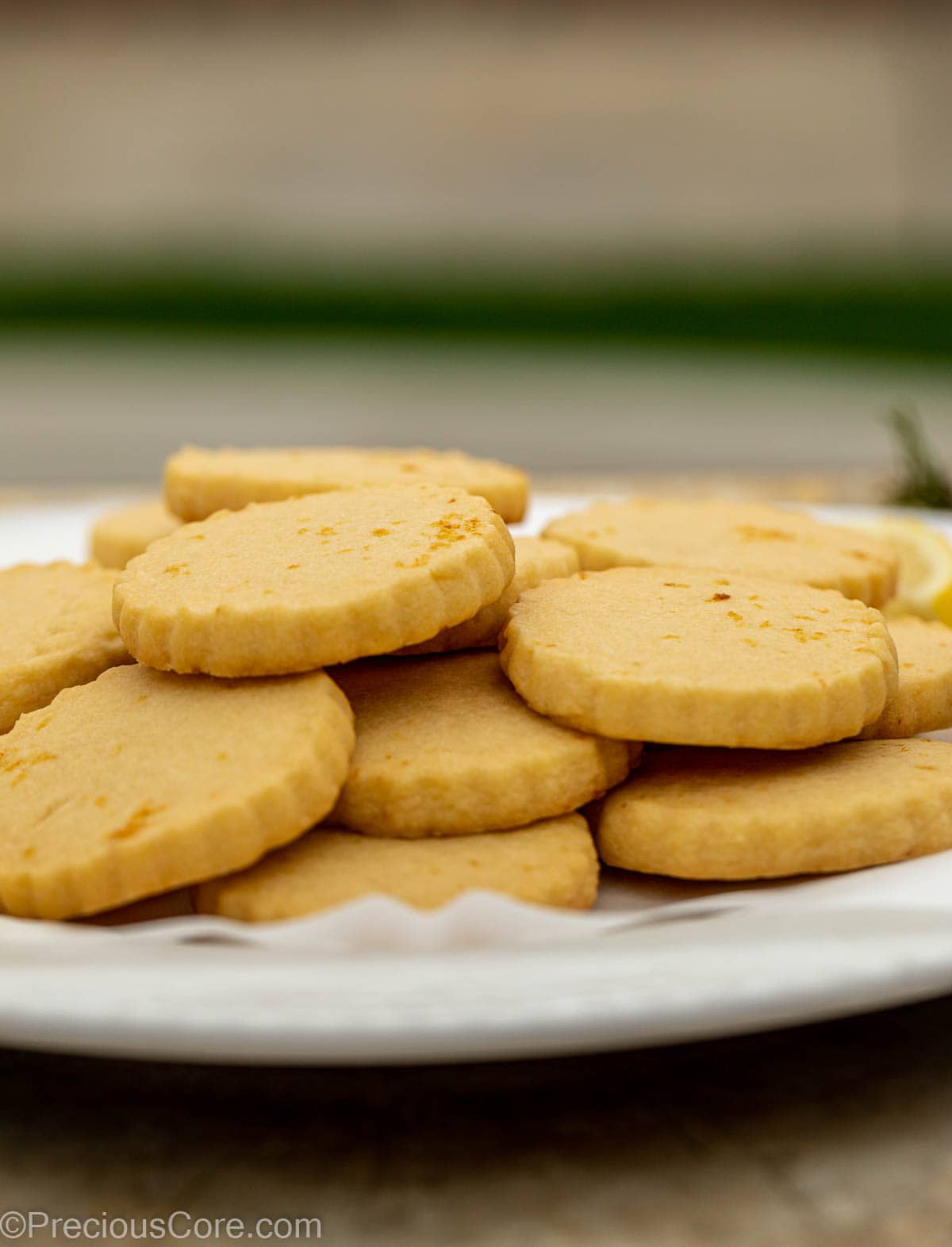 Lemon shortbread cookies on a plate.