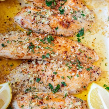 Square image of baked lemon butter tilapia.