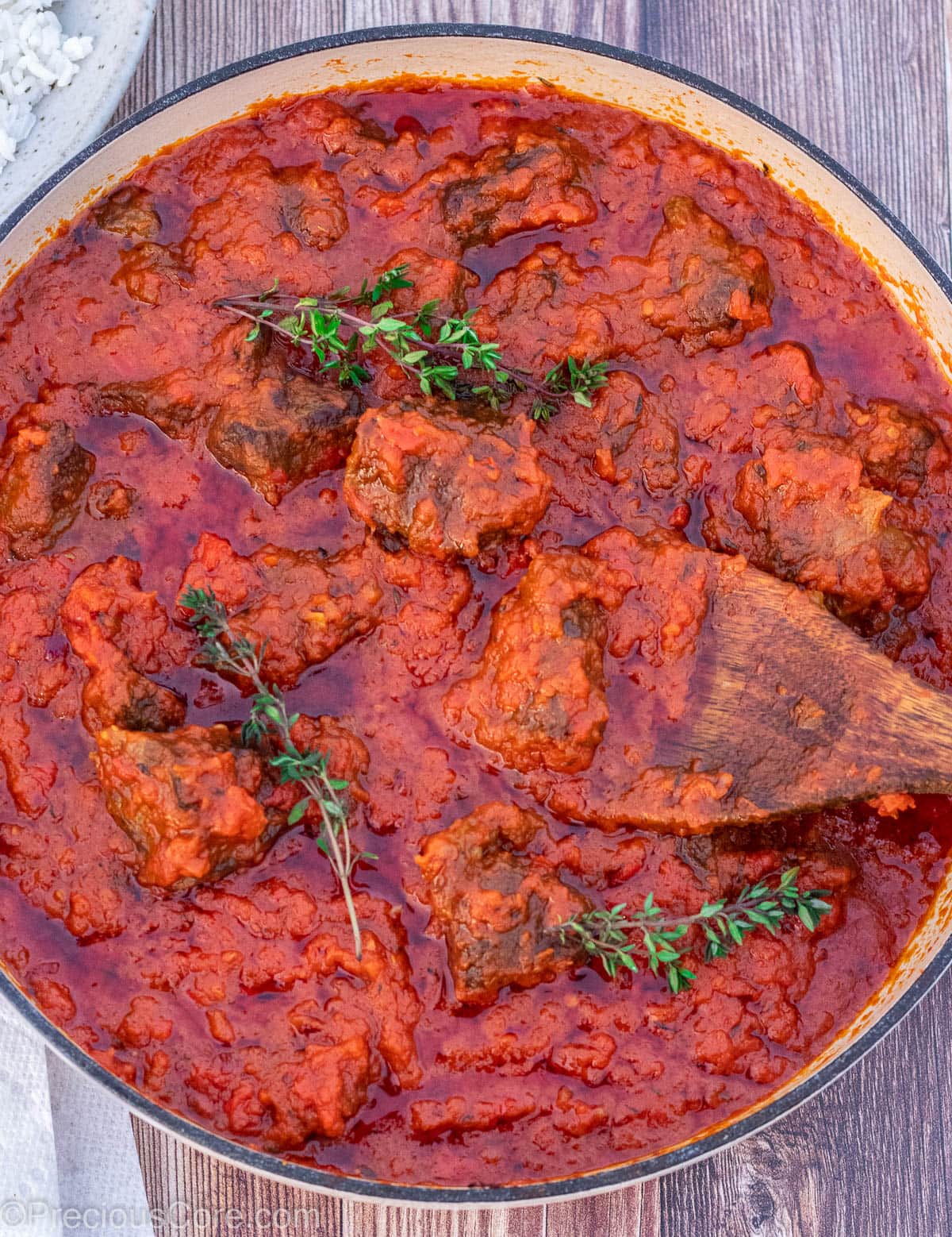 A shallow pot of Nigerian Beef Stew.