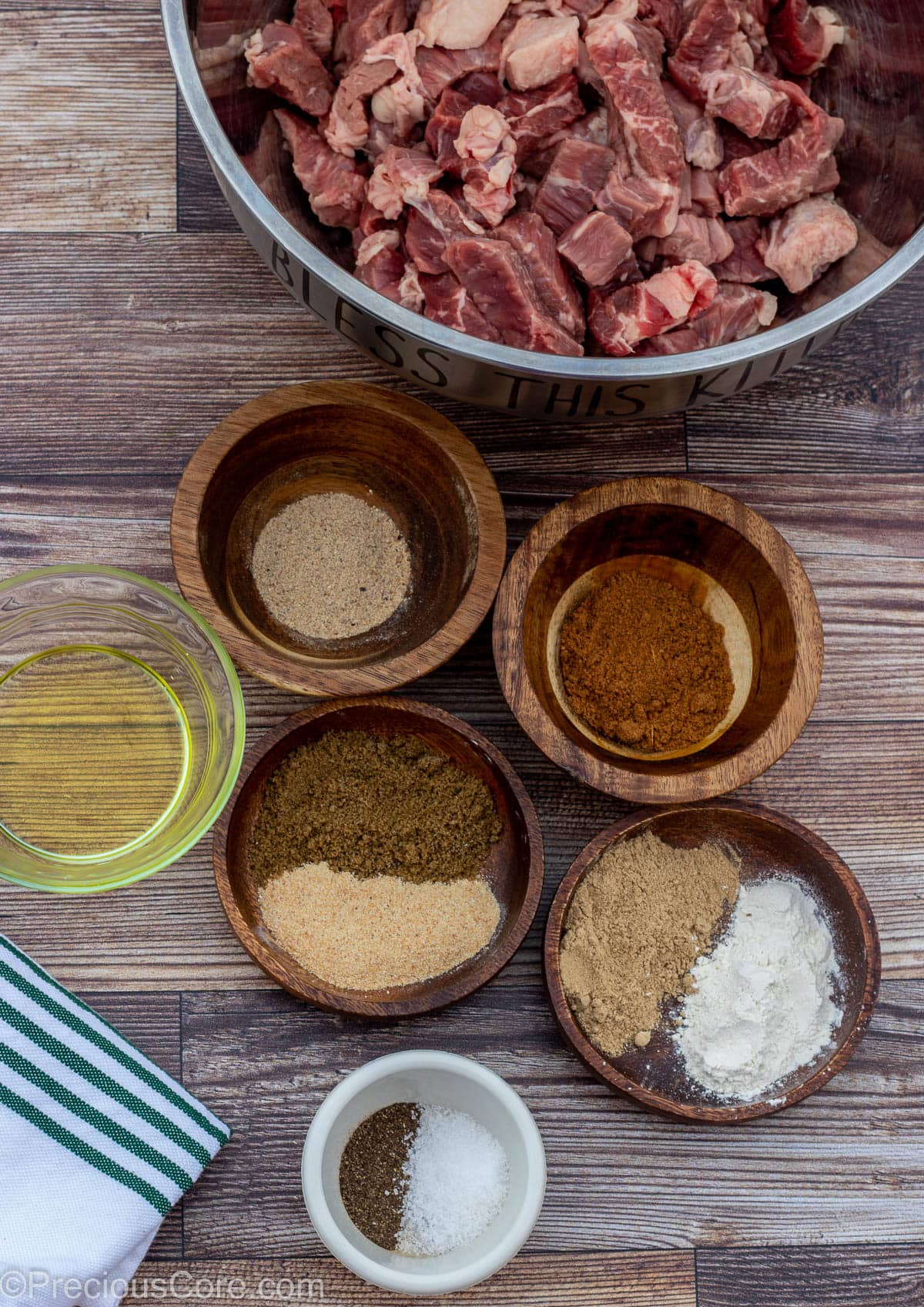 Ingredients for Cameroonian Soya on a brown board.