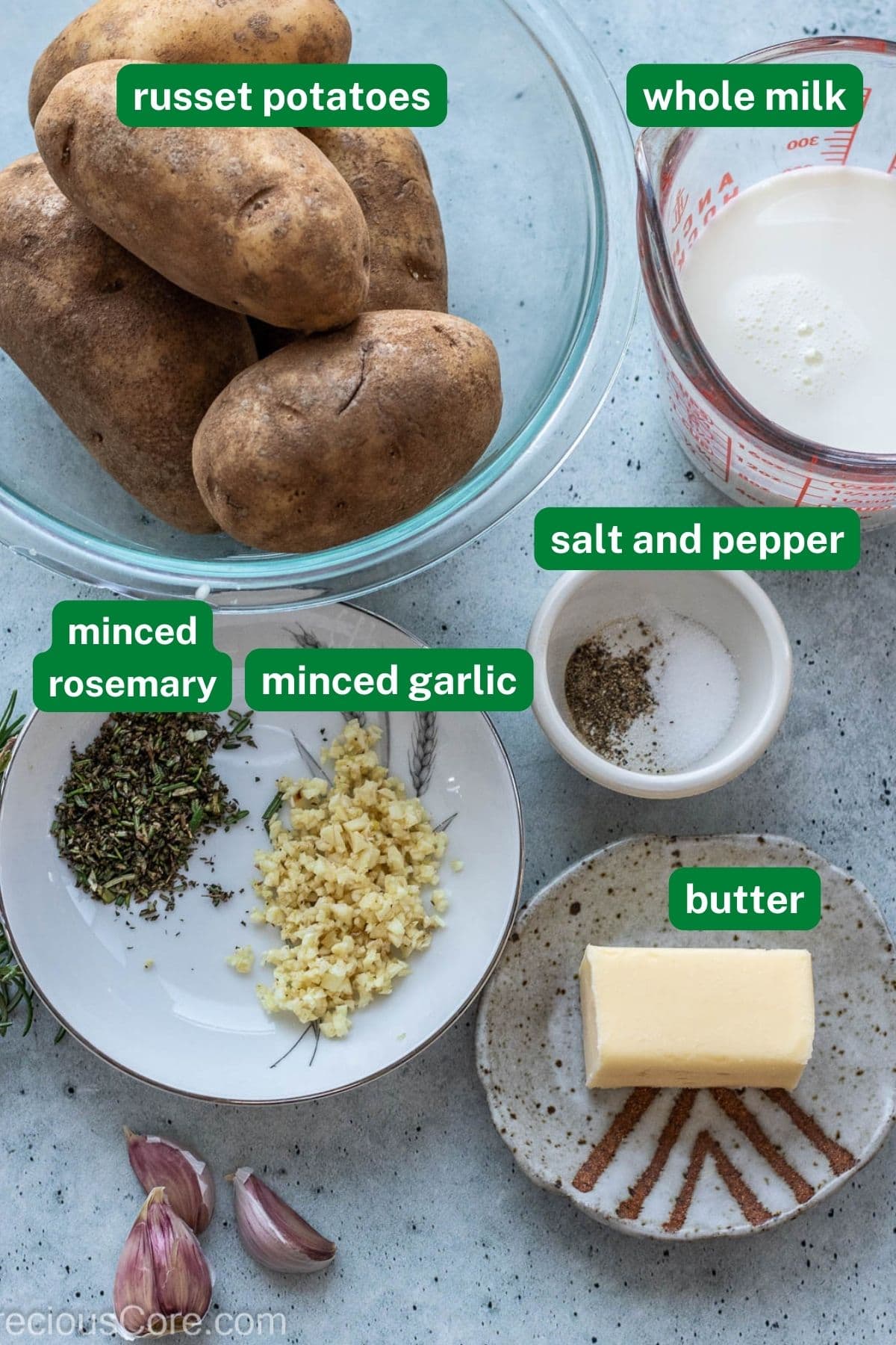 Potatoes, milk, minced garlic and rosemary. salt and pepper, and butter.