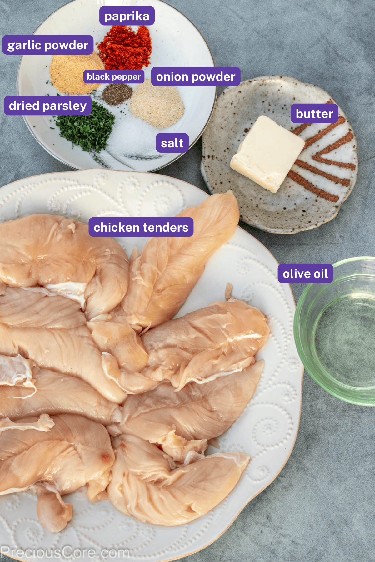 Ingredients for cooked chicken tenders with labels.