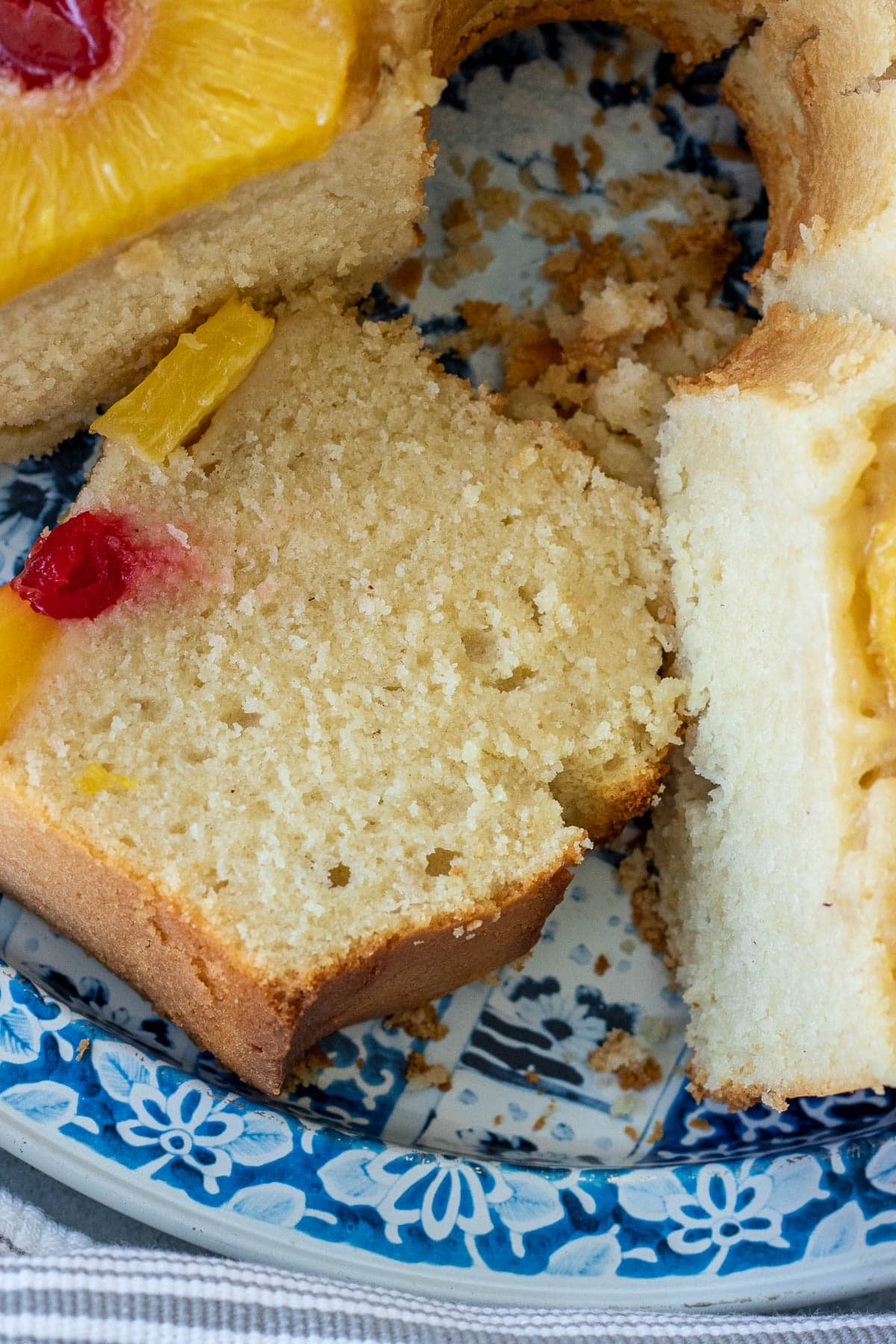 Slice of pound cake on a blue tray.