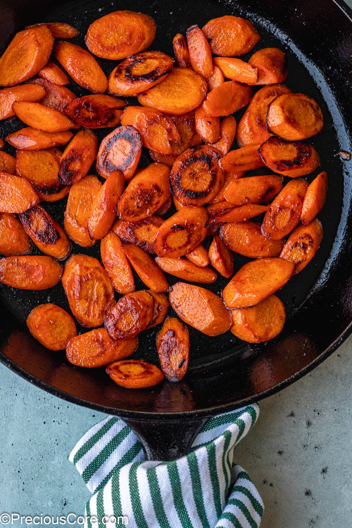 Cooked Fried Carrots in a Skillet.