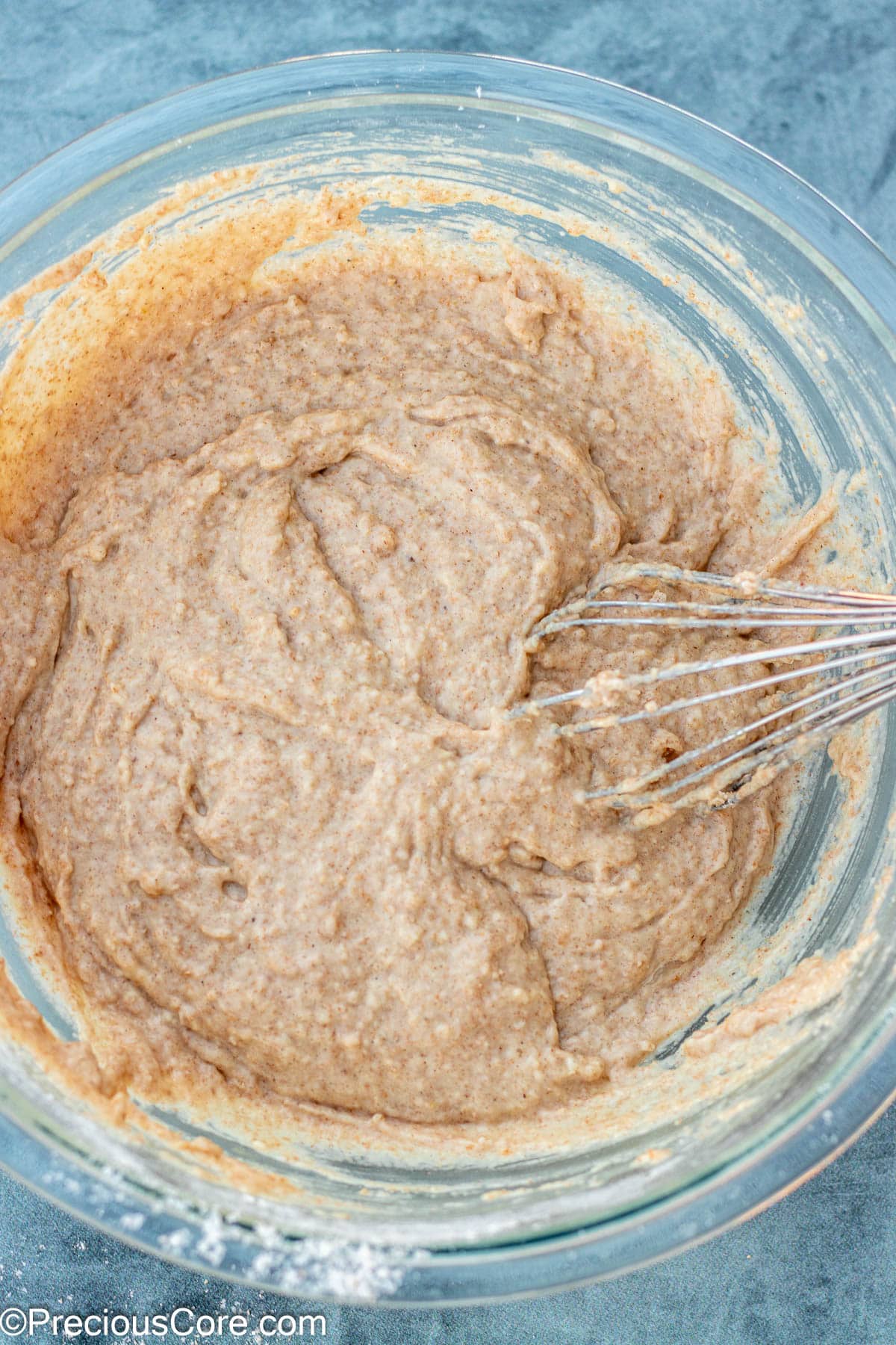 Wet ingredients for muffins whisked together.