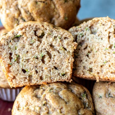 Square image of zucchini muffins.