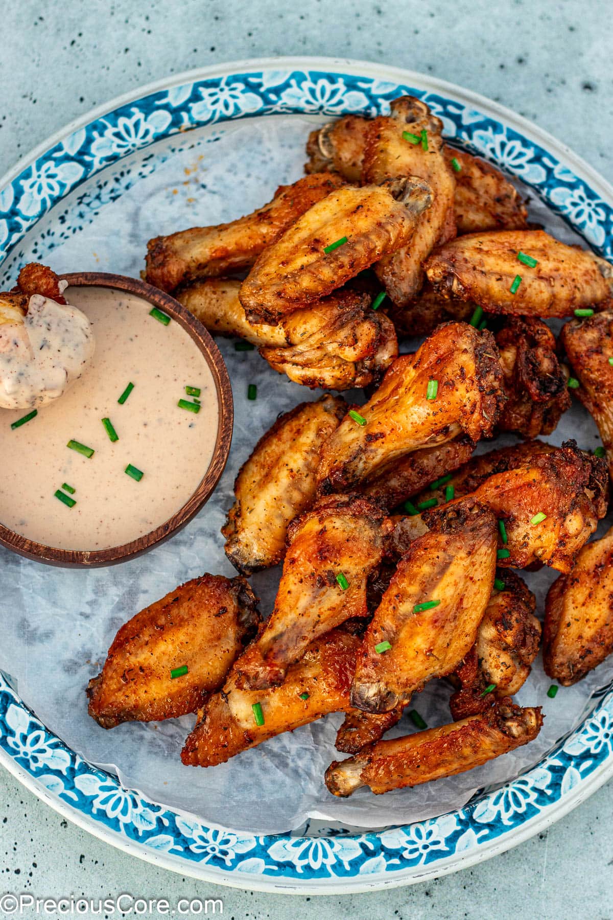 Baked dry rub chicken wing coated in ranch.