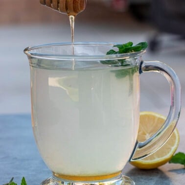 Square image of honey lemon tea.