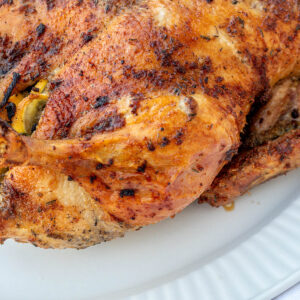 Herb Roasted Duck on a white serving tray.