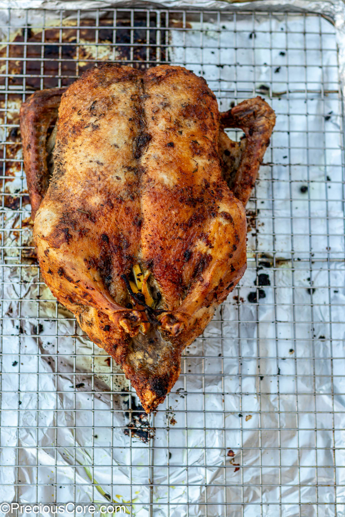 Herb roasted duck on rack.