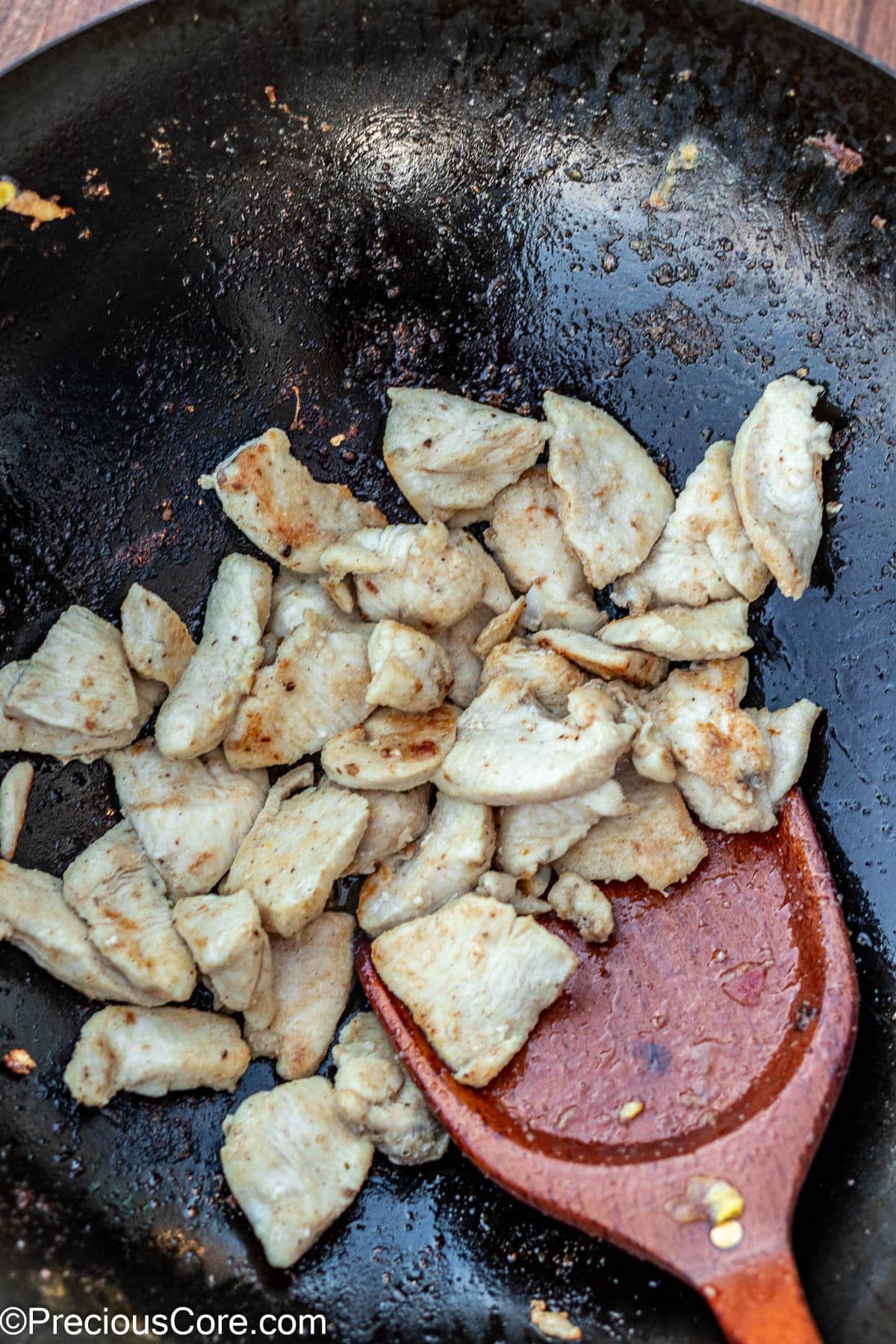 Cooked chicken in a wok.