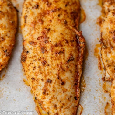 Square image of baked chicken breast.