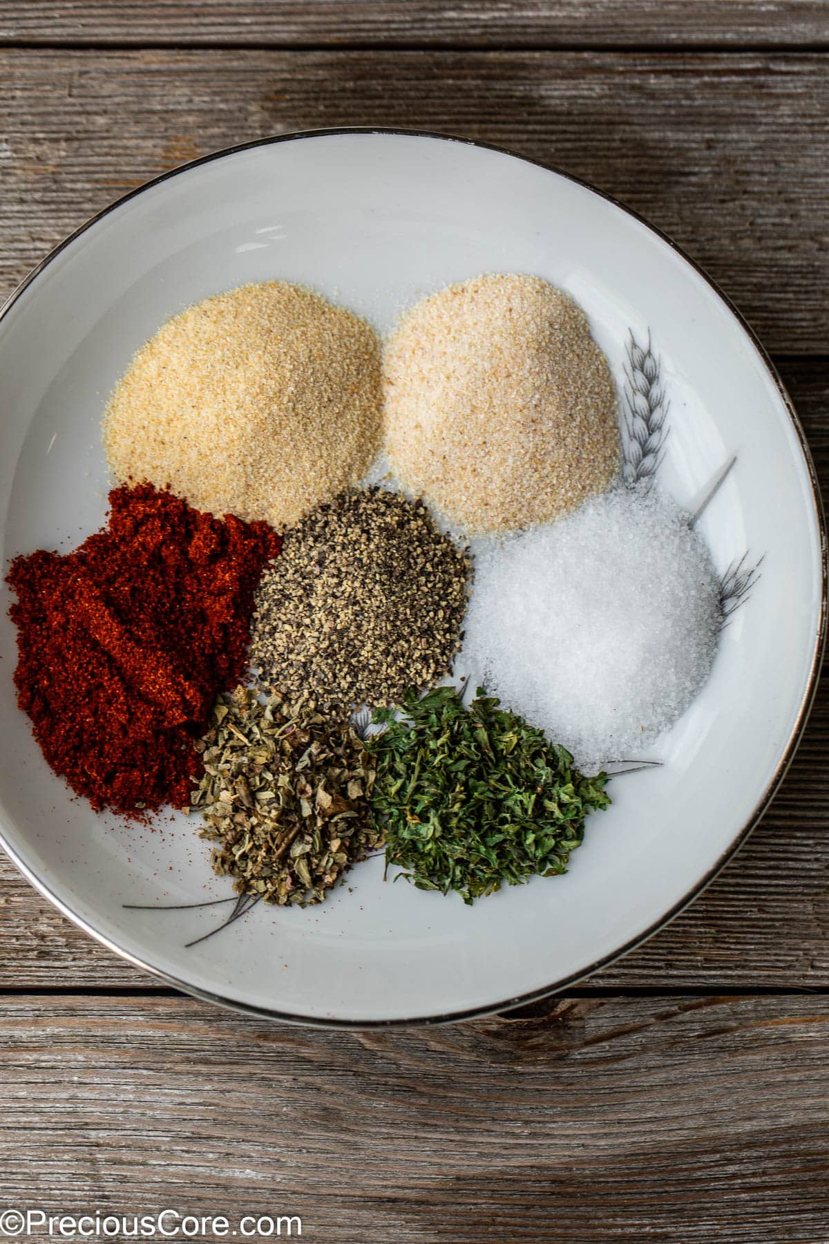 Various spices on a plate.