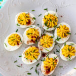 Platter of decorated deviled eggs.