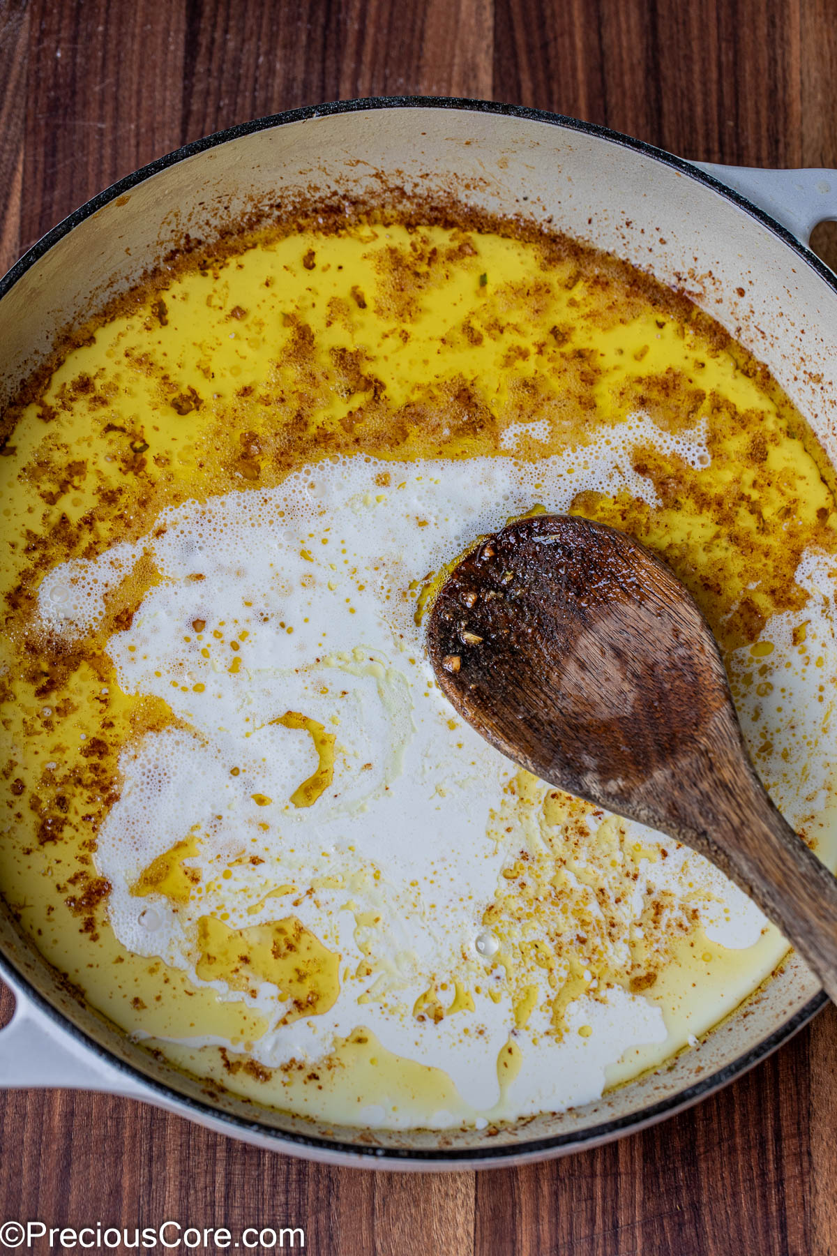 Heavy cream added to melted butter.