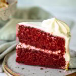 A slice of red velvet cake on a plate.