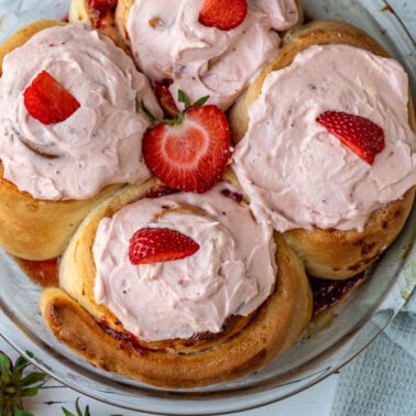 Square image of strawberry cinnamon rolls.