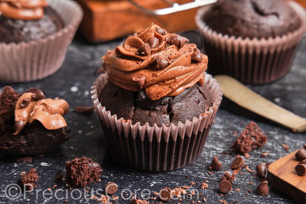 Landscape image of a moist chocolate cupcake.