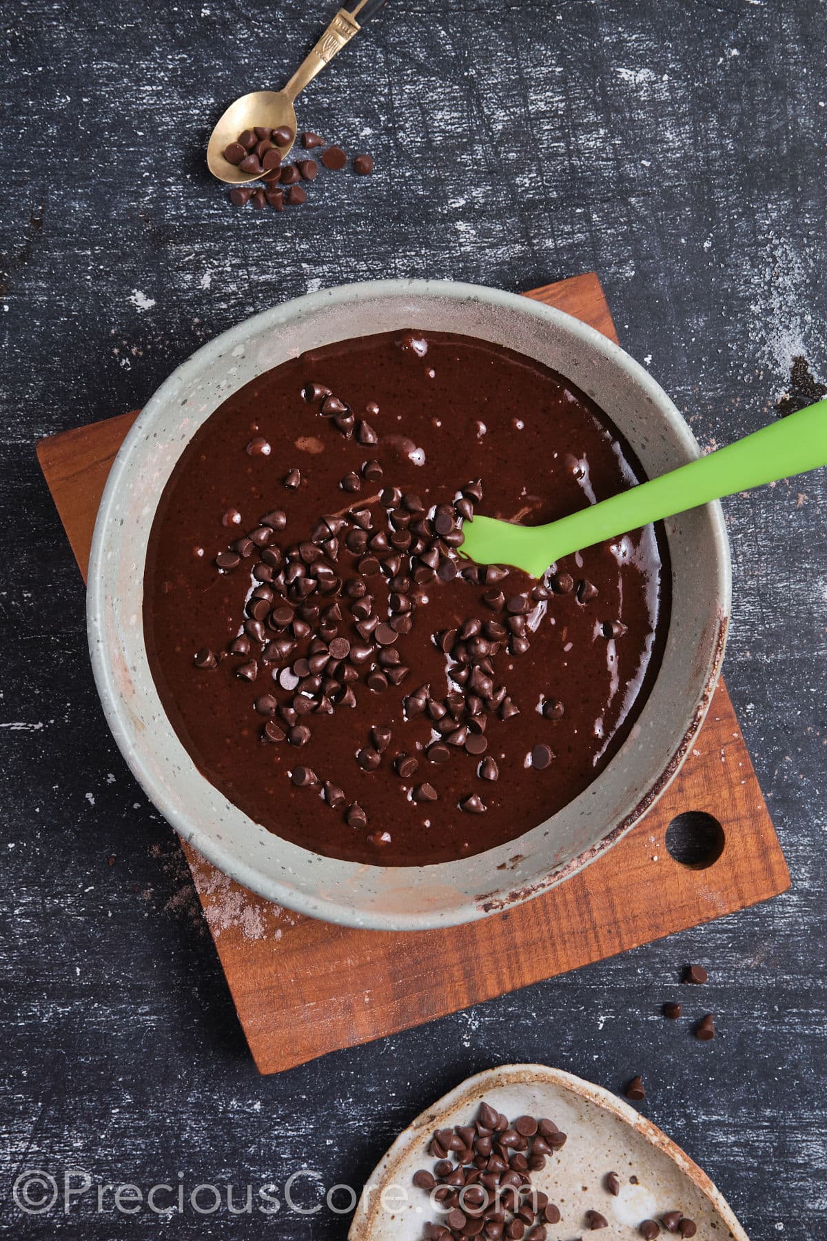 Wet ingredients mixed in with dry ingredients and chocolate chips added.